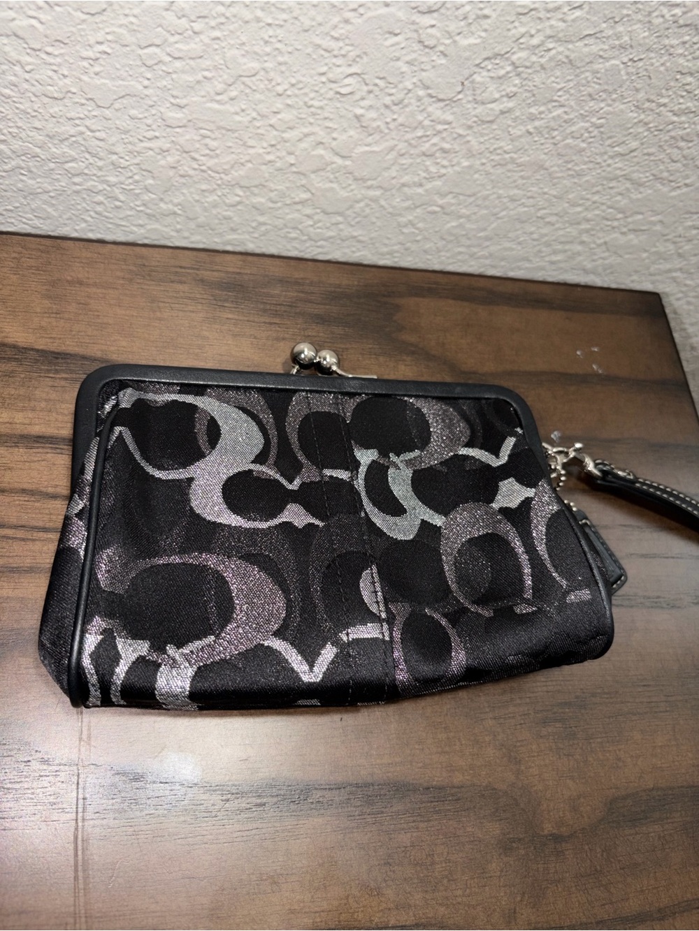 Coach Madison metallic black and silver lurex frame kisslock wristlet